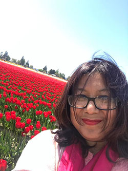 Moushumi Sharmin in field of tulips
