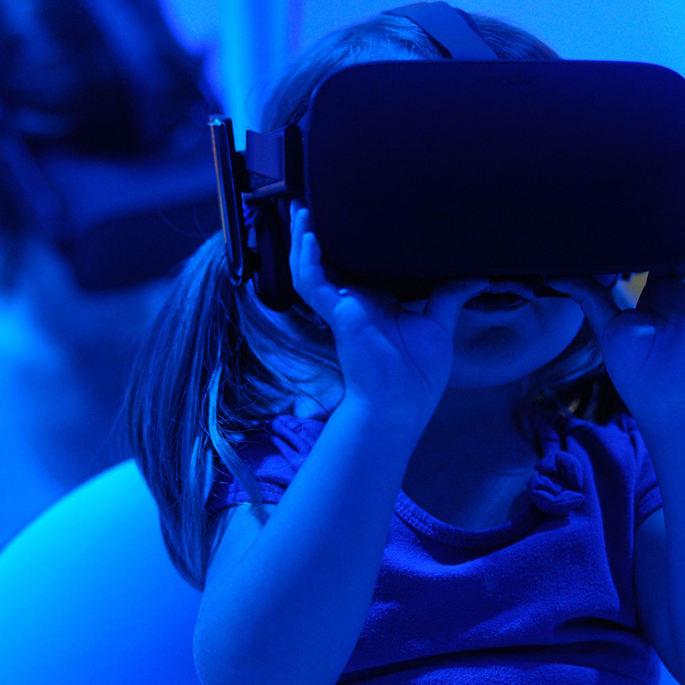 Child using a VR headset
